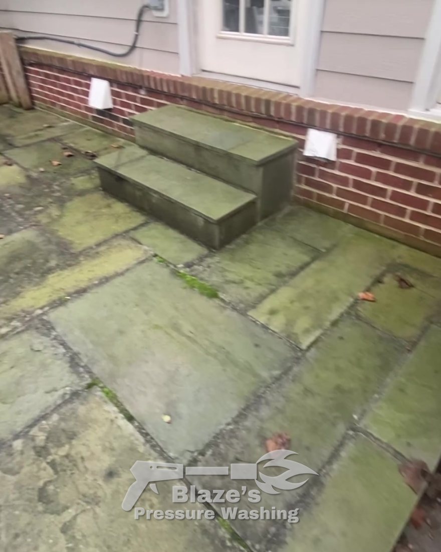 Flagstone patio pressure washing - before, green algae on the stone