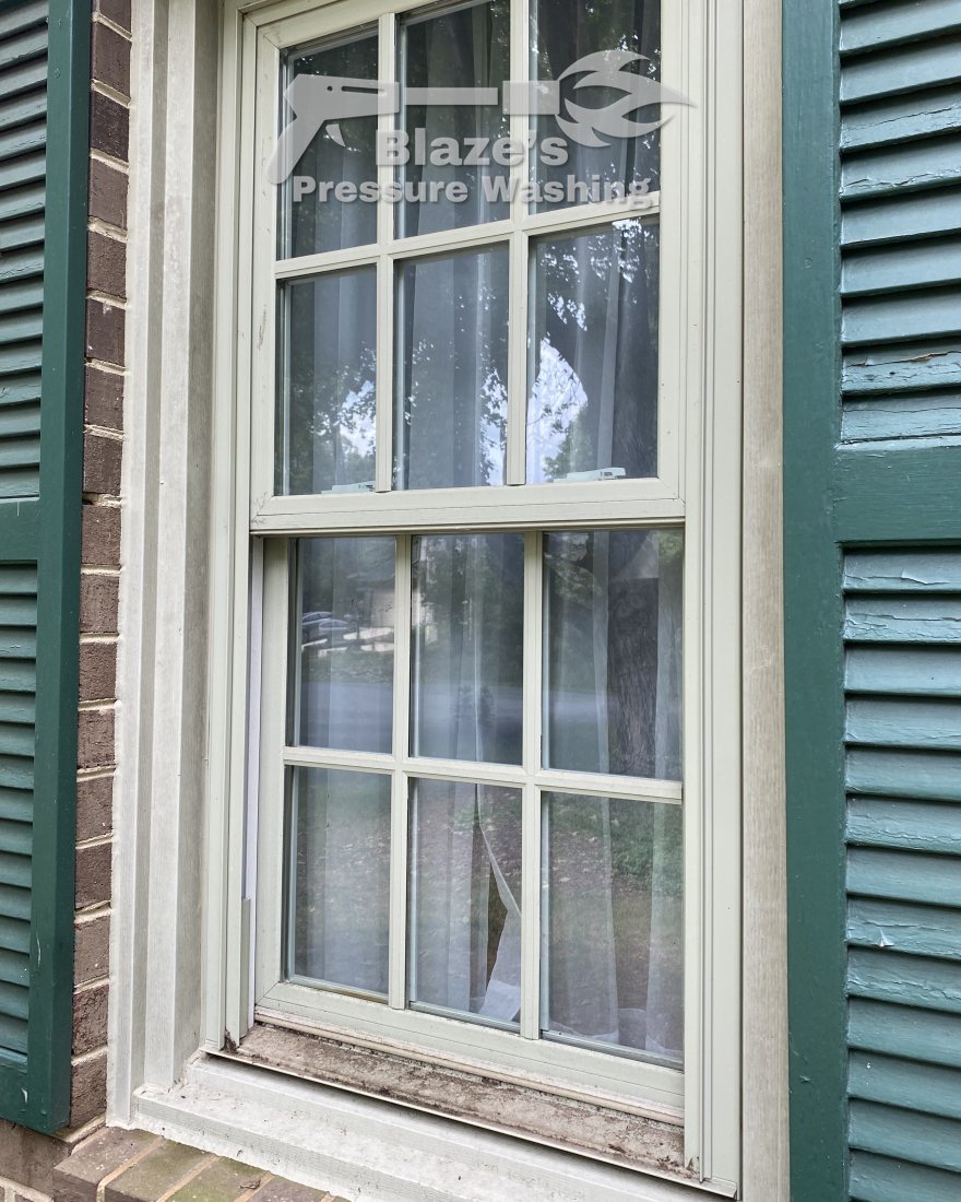 Window cleaning Reston VA - before, dirty glass and sill
